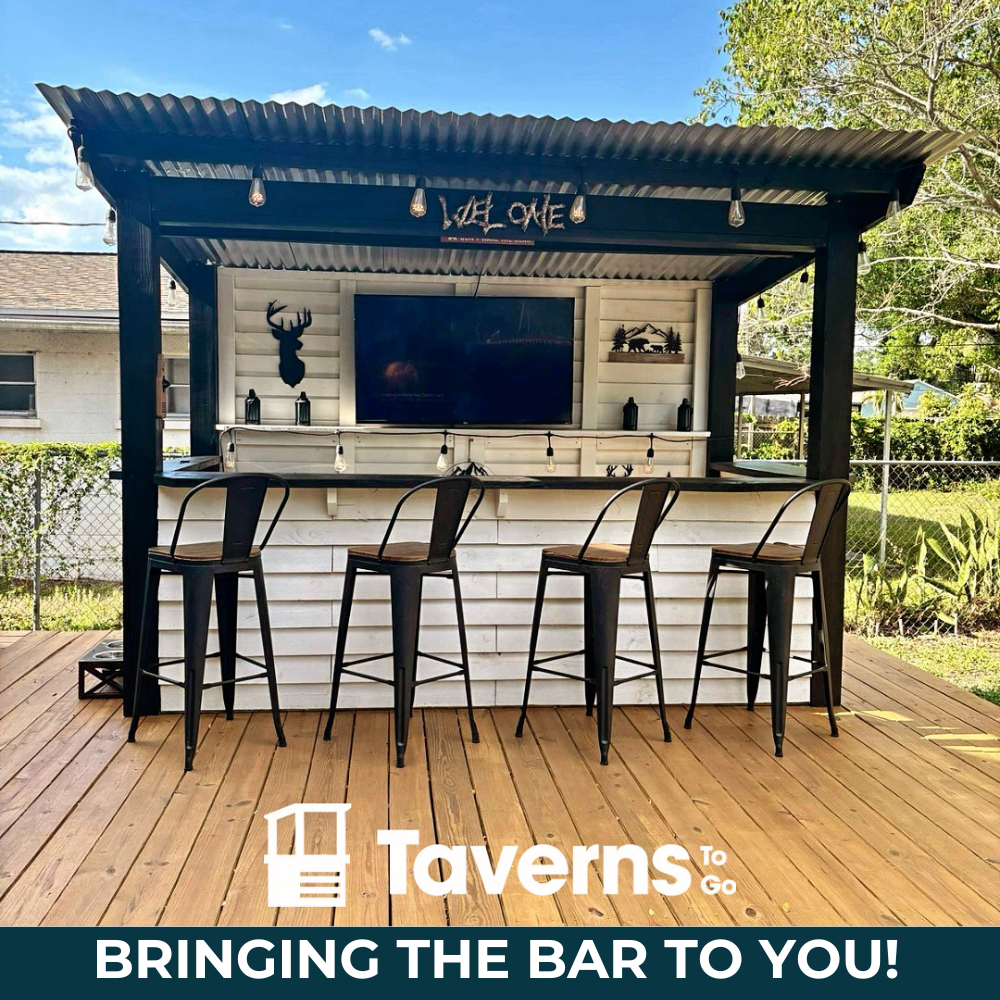 Custom patio bar setup with red, white and blue decorations for 4th of July outdoor celebration party