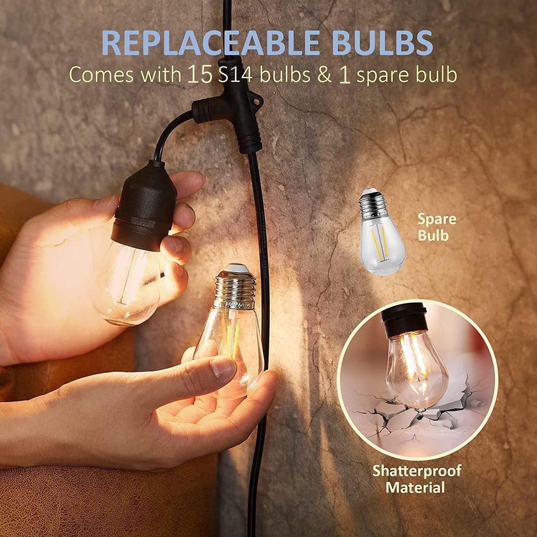 Person replacing a light bulb with a spare bulb, highlighting shatterproof material and included bulbs.