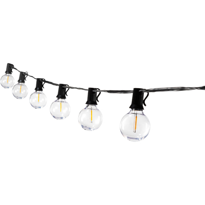 String of clear outdoor lights with black holders on a white background