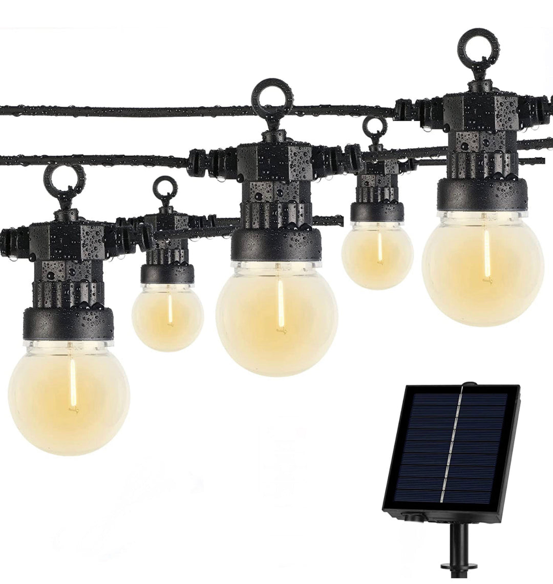 Outdoor solar LED string lights with retro Edison globe bulbs, including a solar panel.