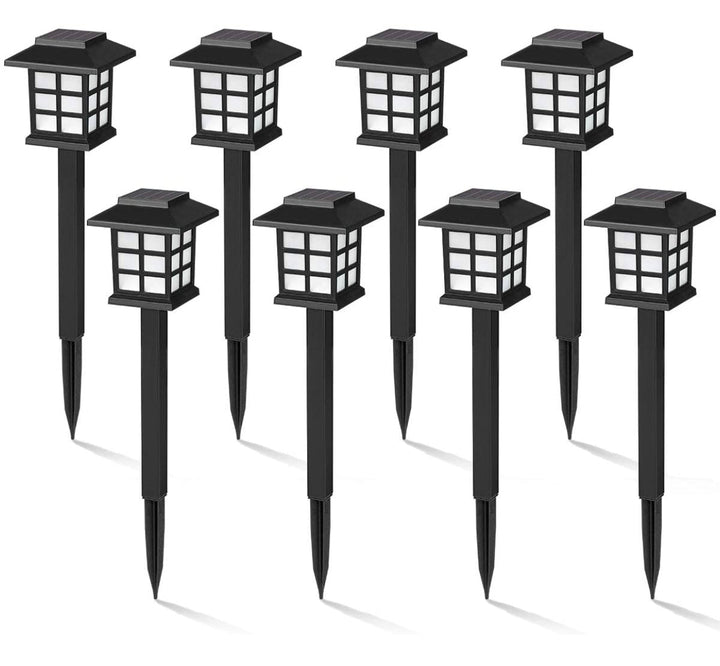 A pack of 12 black solar pathway lights with a Asian style design, featuring a warm white light source and a rectangular shape.